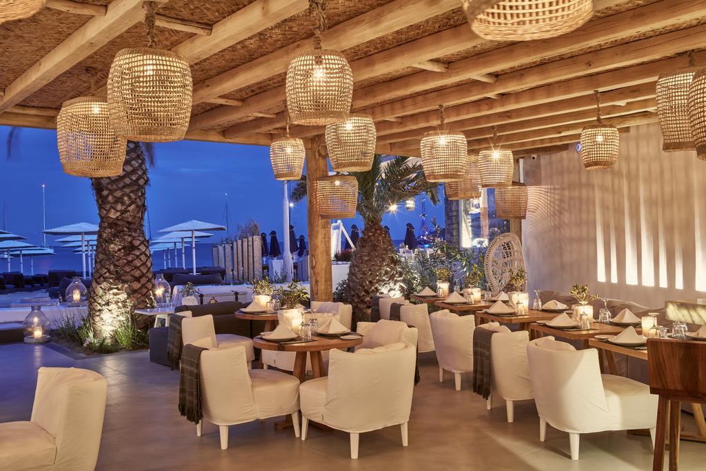 فندق ميكونوس آموس - فنادق صمول لكجوري أوف ذا وورلد أورنوس المظهر الخارجي الصورة The restaurant at the Mykonos Grand Resort